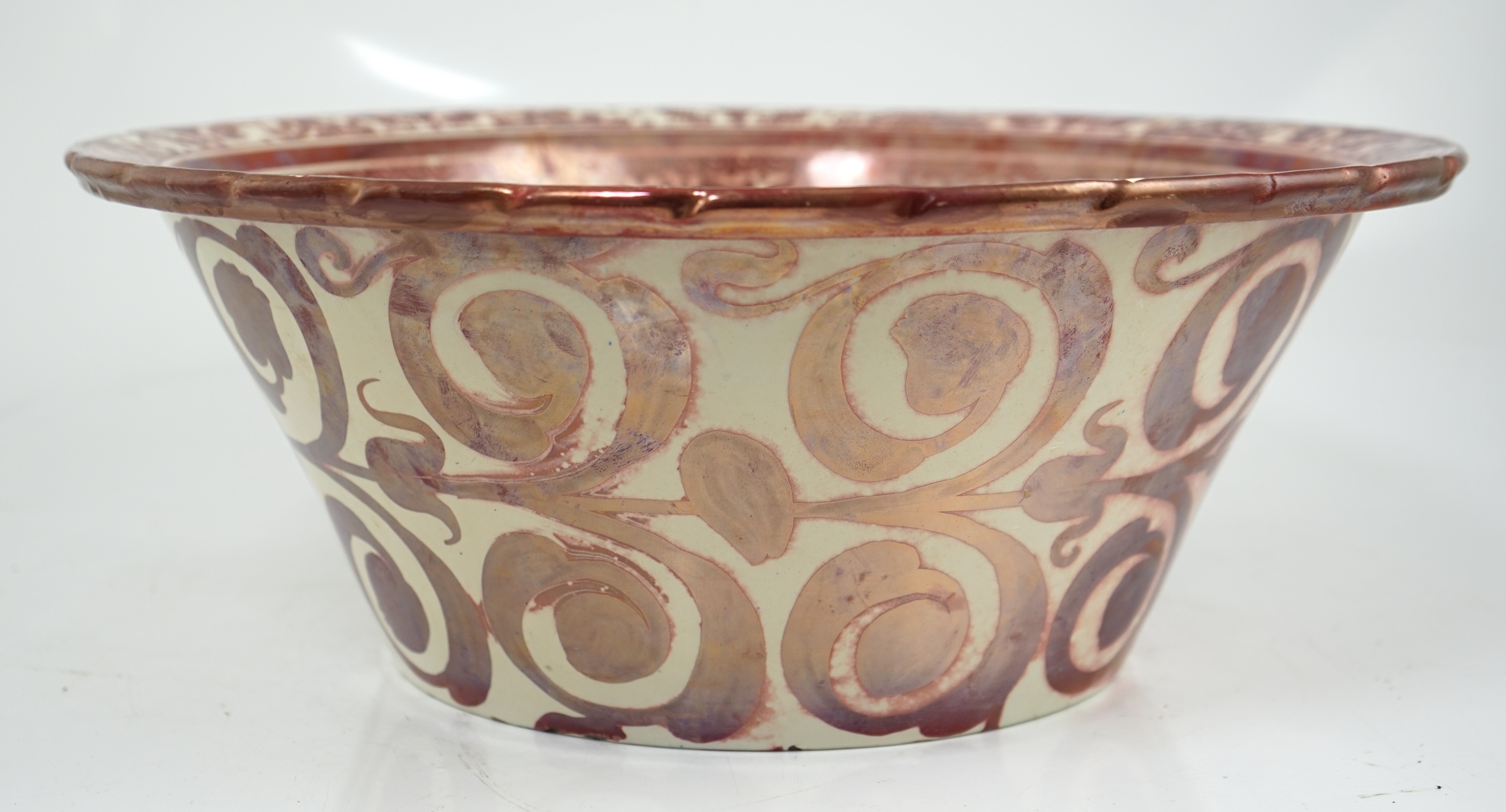 Ulisse Cantagalli, a large Hispano-Moresque style ruby-copper lustre basin, c.1900, some restoration